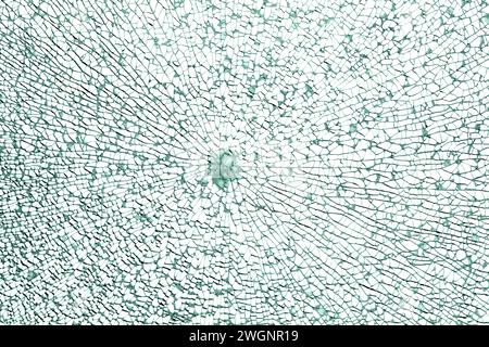 Full frame shot of a broken safety glass pane in white back Stock Photo