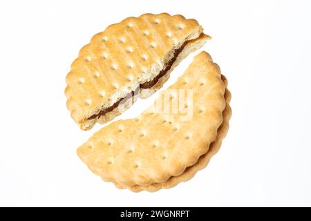 Sandwich Biscuit With Cocoa Cream Filling snapped in two Stock Photo
