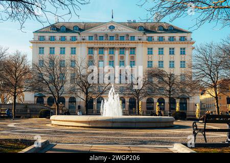 Esplanade Zagreb Hotel building, historic luxury hotel in Zagreb. In front of it is a park with a fountain. Croatia. Stock Photo