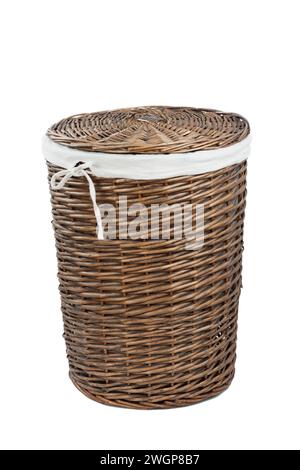 Wicker laundry basket with closed lid isolated on white background Stock Photo