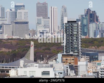 TOKYO, JAPAN - January 26, 2024: Overhead view of the roof of buildings in Tokyo's Shibuya area including Jingumae and Shijuku skyscrapers in distance. Stock Photo