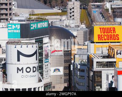 TOKYO, JAPAN - January 26, 2024: Overhead view of the roof of buildings in Tokyo's Shibuya area including Tower Records, Modi and Nitori with Jingumae Stock Photo