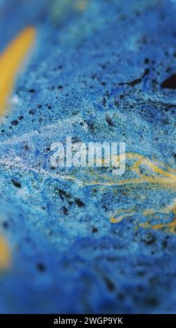 Abstract background pigment blend yellow blue Stock Photo