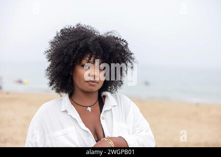 Portrait of a young black woman on the beach Stock Photo