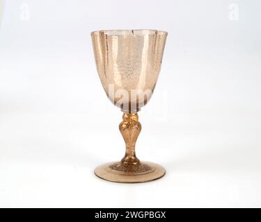 Antique 1900s Salviati Venetian gold leaf liqueur wine glass of quatrefoil form. Stock Photo