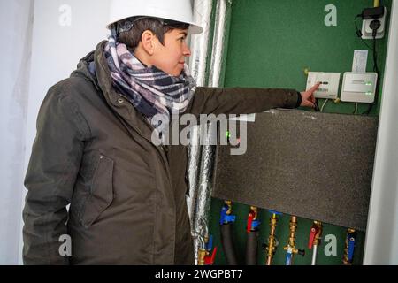 Female Construction manager walking around site Stock Photo