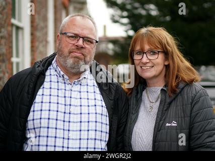 Stephen Lewsey supported by his wife Cathy during an interview with PA Media, at Sussex Police headquarters in Lewes, after he waived his right to anonymity to encourage other victims of abuse to come forward. Mr Lewsey's abuser Glenn Langrish, also known as Glenn Stephens, was jailed for 15 years at Hove Crown Court for his crimes dating back to the 1980s, after being subject to an international manhunt for 12 years. Picture date: Tuesday February 6, 2024. Stock Photo