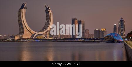 Lusail skyline Lusail city, Qatar including Katara Towers project from Lusail marina night shoot .Construction industry concept. Stock Photo