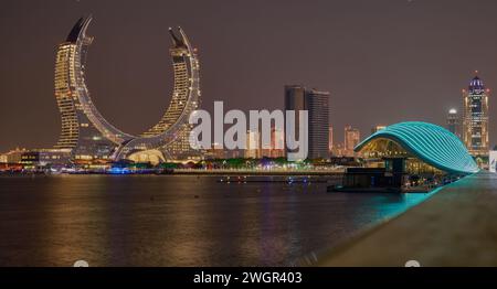 Lusail skyline Lusail city, Qatar including Katara Towers project from Lusail marina night shoot .Construction industry concept. Stock Photo