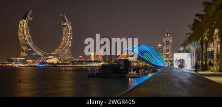 Lusail skyline Lusail city, Qatar including Katara Towers project from Lusail marina night shoot .Construction industry concept. Stock Photo