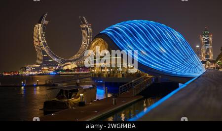 Lusail skyline Lusail city, Qatar including Katara Towers project from Lusail marina night shoot .Construction industry concept. Stock Photo