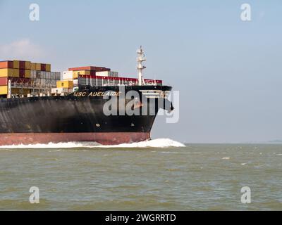 Bow of container ship MSC Adelaide sailing on Westerschelde in the Netherlands en route to port of Antwerp, Belgium Stock Photo