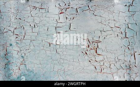 Texture of old peeled blue paint on the wall. Stock Photo