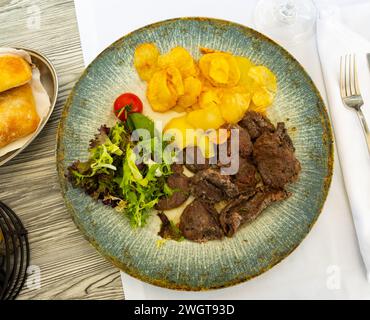 Portion of pork fillets in homemade marinade Stock Photo