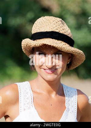 Young woman outdoors, Milano; Italy Stock Photo