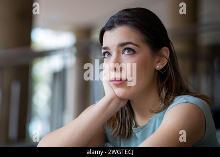 portrait of young woman in love looking up Stock Photo
