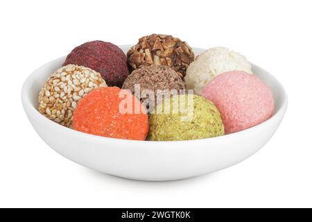 A variety of different truffles in a ceramic bowl Isolated on a white background Stock Photo