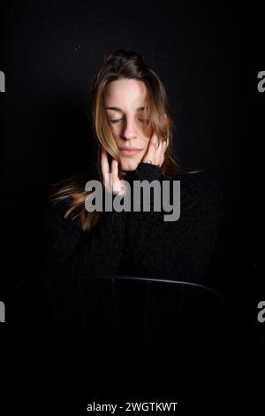 Young woman indoors, Milano, Italy. Stock Photo