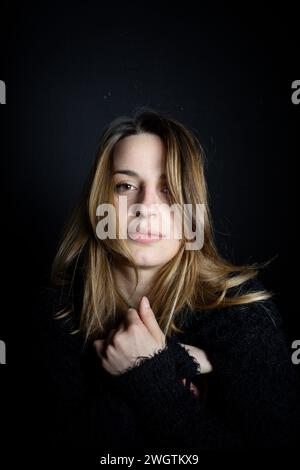 Young woman indoors, Milano, Italy. Stock Photo