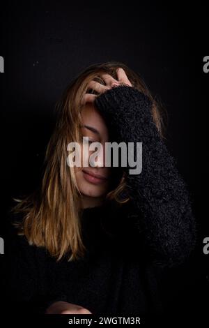 Young woman indoors, Milano, Italy. Stock Photo
