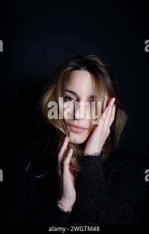 Young woman indoors, Milano, Italy. Stock Photo