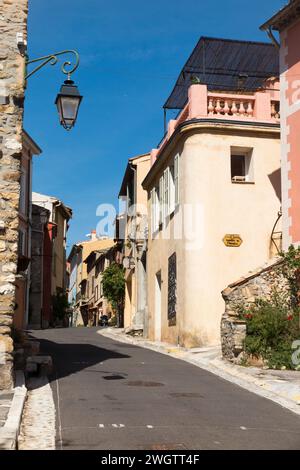 Steep street / road scene in Cagnes-sur-Mer, French Riviera town near Nice which has a historic popularity with artists and painters. France. (135) Stock Photo