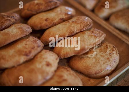 Sweetish Bakery pastry snack. Sochnik - Russian curd cake baked in the oven. Sochen sweet made from shortcrust pastry with cottage cheese filling. Fre Stock Photo
