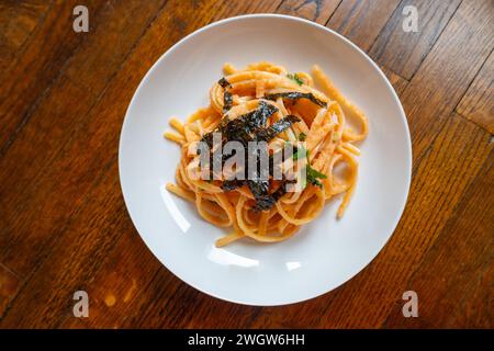 Mentaiko spaghetti on white dish. Stock Photo