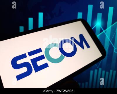 Konskie, Poland - February 05, 2024: Secom company logo displayed on mobile phone Stock Photo