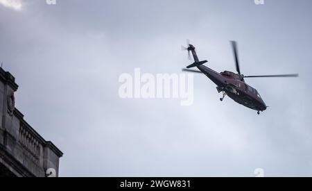 London, UK. 6th Feb, 2024. HRH Prince Harry followed by their Majesties The King and the Queen Consort leave  Clarence House for Buckingham Palace, with the royal standard flying and a large number of media crews watching, they then, it is reported, took off in a helicopter from the gardens of Buckingham Palace Credit: Ian Davidson/Alamy Live News Stock Photo