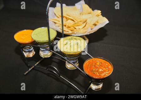 Mexican Cuisine Appetizer Platter with Tortilla Chips and Dips Stock Photo