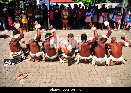 Zulu traditional dancers entertain the crowds during the iLembe Book Festival at the Luthuli Museum in Groutville, Kwa-Zulu-Natal in South Africa. Stock Photo