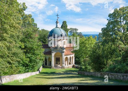 Sacred way with an ancient chapel, World Heritage Site – Unesco . Sacro Monte di Varese or Santa Maria del Monte, Italy, with the fourth chapel Stock Photo