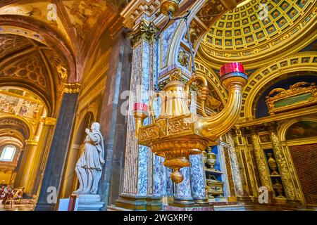 CREMONA, ITALY - APRIL 6, 2022: The vintage golden chandelier at the Altar of Holy Thorn in Cremona Cathedral, Italy Stock Photo