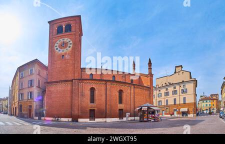 Panorama of historic Piazza del Borgo with medieval brick Santa Brigida d'Irlanda Church, Piacenza, Italy Stock Photo