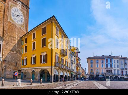 Panorama with old clocktower of the Lodi Cathedral and historic houses on Piazza della Vittoria, Lodi, Italy Stock Photo