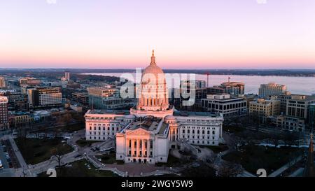 Aerial photograph of sunset over Madison, Wisconsin on a beautiful winter evening. Lady Forward is the statue atop the Wisconsin State Capitol buildin Stock Photo