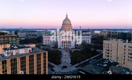 Aerial photograph of sunset over Madison, Wisconsin on a beautiful winter evening. Lady Forward is the statue atop the Wisconsin State Capitol buildin Stock Photo