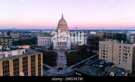 Aerial photograph of sunset over Madison, Wisconsin on a beautiful winter evening. Lady Forward is the statue atop the Wisconsin State Capitol buildin Stock Photo