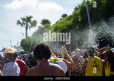 Salvador, Bahia, Brazil - February 03, 2024: Revelers are seen having fun during the Fuzue pre-carnival parade in the city of Salvador, Bahia. Stock Photo