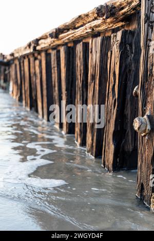 The iconic erosion groynes at sunrise in Victor Harbor South Australia ...