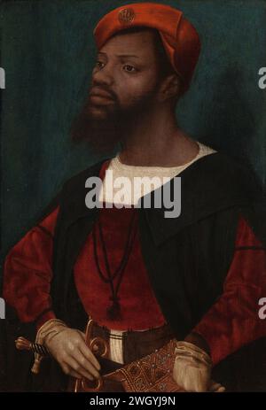 Portrait of an African Man, c. 1525 - c. 1530 painting African man in European clothing. Standing, halved, three-quarters to the left used to a blue-green background. He is wearing a red beret (Klappap) on which a pilgrim sinsign from Onze-Lieve-Vrouwe van Halle, near Brussels. The man has a mustache and beard that ends in two points. He is wearing a white shirt without a collar over which a red wambuis and a short black cloak (taboling) and white, goat leather gloves. With his right hand, he comprises the empire edited of his sword. His left hand in his side. A richly embroidered bag on his l Stock Photo