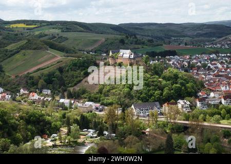 Bad Munster, Germany - May 12, 2021: Sun shining on castle Rheingrafenstein on a hill above Bad Munster, Germany. Stock Photo