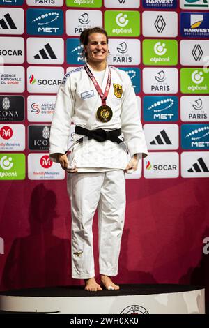 Paris, France. 04th Feb, 2024. Anna-Maria Wagner of Germany seen at the podium with Gold Medal during the Women's -78kg 2024 Judo Grand Slam Paris. The Accor Arena, in Paris, hosted the Paris Grand Slam from 2nd to the 4th of February, an event of the world circuit of the International Judo Federation (IFJ). On Sunday, the last day of the competition, athletes of Men with 90kg and 100kg and Women with 78kg, and  78kg categories competed. (Photo by Telmo Pinto/SOPA Images/Sipa USA) Credit: Sipa USA/Alamy Live News Stock Photo