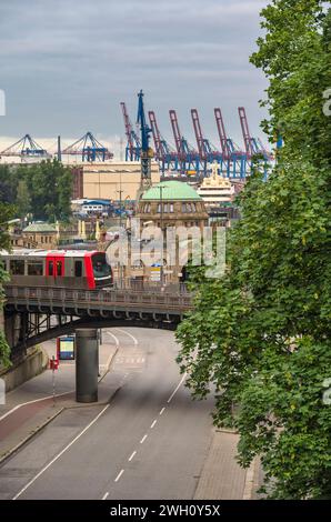 Hamburg Germany, city skyline at St. Pauli Landing Bridges (Landungsbrucken) pier and Hamburg harbour with metro train Stock Photo