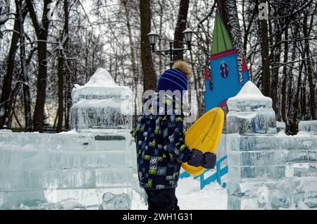 Figures and buildings made of ice in a park, Moscow Stock Photo