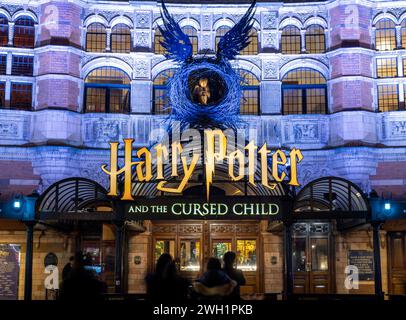 London. UK- 02.04.2024. A night time view of the main display on the facade of the Palace Theatre for the show Harry Potter and the Curse Child. Stock Photo