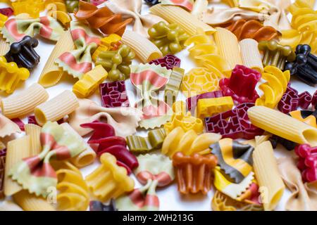 various types of pasta on white surface Stock Photo