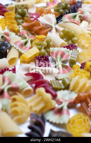 various types of pasta on white surface Stock Photo