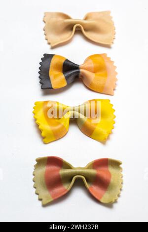 bow tie pasta isolated on white surface Stock Photo